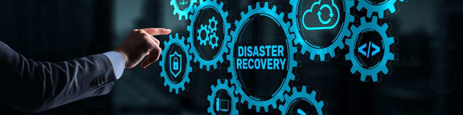A person’s hand points at interconnected blue gears on a screen, with the central gear labeled Disaster Recovery, highlighting backup solutions and data security icons—essential tools for small businesses managing digital technology.